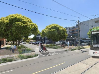 Render of a raised platform crossing and additional greenery on Keilor Road.